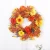 Import Chrysanthemum wreath high quality centerpieces leaves spring summer hanging artificial chrysanthemum flower wreath from China