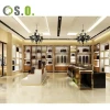 High End Golden Shopping Mall Bags Store Interior Design Bag Display Cabinet