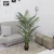 Import manufacturer decorative indoor and outdoor green bonsai artificial leaves plastic palm tree plants from China