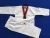 Import OEM martial arts Customized Martial art wear kwon KIDS taekwondo uniform from China