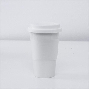 Ready to ship wholesale anti heat 11oz ceramic single wall travel coffee cup coffee tumbler with silicone lid and sleeve holder