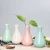 Import Simple ceramic vase creative household desktop decoration tripod hydroponic vase decorative vase ceramic aromatherapy bottle from China
