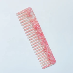 Wide tooth pink plastic hair straightener acetate combs