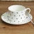 Import simple black dot design new bone china ceramic coffee cup and saucer,gold decal printing ceramic cup with saucer from China