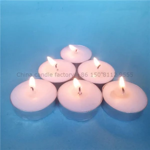 paraffin wax white bright candle with yellow box