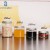 Import 250ml 380ml Glass Food Storage Jar with Screw Lids from China