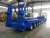 Import 4 axles 60tons low bed semi trailer with extension from China