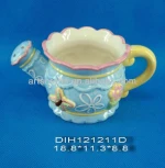 Ceramic garden sprinkler with butterfly design