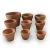 Import Cheap colorful small ceramic flower pots &amp; planters for home from China