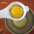 Import creative kitchen gadgets egg tools plastic white egg separator from China