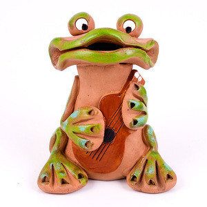 Frog with a guitar clay figurine