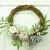 Import FSC BSCI natural twigs wicker hanging craft pumpkin pinecone white berry leaves decoration Christmas wreath from China