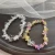 Import Handmade Colorful Jewelry Crystal Bracelet Butterfly Pattern Adjustable Beaded Stone Bracelet from China