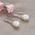 Import LUOTEEMI Women Elegant Waterdrop Sea Shell Pearl Brass Jewelry Dangle Earrings from China