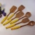 Import natural color bamboo disposable dinnerware set with silicone handle spoon from China