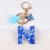 Import New blue butterfly fringe Heart letter key chain 26 sequin letter pendant for ladies from China