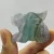 Import Wholesale natural hand carved rainbow fluorite rabbit crystal craft for gift from China