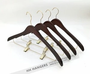 Wooden brown hangers with brass gold clips for hotel,hospitality clothes hangers