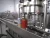 Import Automatic tin canned coconut water production line/PET bottled juice filling line from China