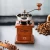 Import Factory price Portable household mini manual coffee grinder with Log wood handle from China