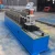 Import Galvanized steel roller shutter door lath roll forming machine from China