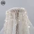 Import Good selling elegant luxury floral handwork white beaded sequin stretch french lace fabric from China
