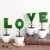 Import home Decor Love Letters White Ceramic Artificial Plants Pots Faux Bush Planters Tabletop Hedge Sculptures from China