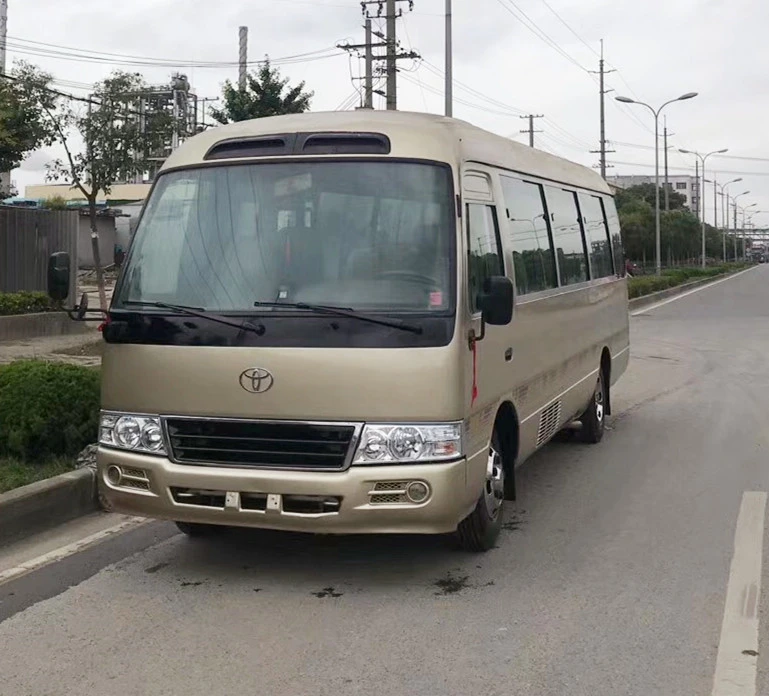 LHD 2016 Japan used good condition Toyotai coaster bus with diesel engine 25 seats golden silvery for seal