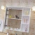 Import Oak wood bathroom furniture with marble countertop and mirror standing side cabinet from China