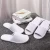 Import OEM Custom Logo Personalized Wholesale Luxury Cheap White Washable Hotel Room Spa Guest Disposable Cotton Terry Slippers from China