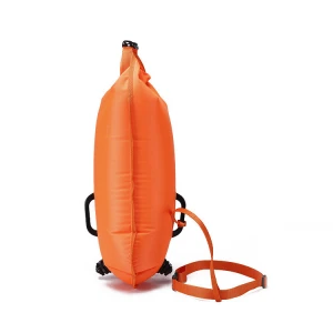 Orange inflatable swim buoy for swimmer
