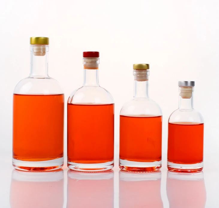 Stocked high quality 50ml 100ml 200ml 500ml 700ml 750ml 1000ml 3000ml Vodka Whiskey Brandy glass bottle with cork top lid