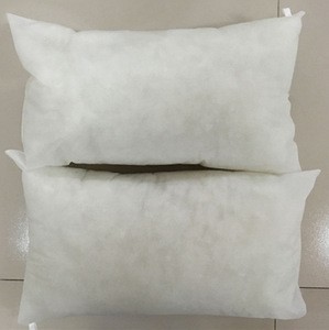 white disposable airline pillow with sewn-in label and cheap price