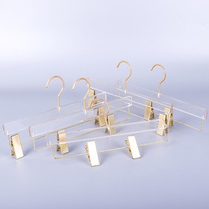Wholesale custom logo clear acrylic clip pants dress skirt display trousers hangers with gold clips