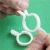 Import 100pack Plastic Snap Clips For Scarf, leather swatch hanger gridwall cap rug socks gloves photo drawing twist loop display hook from China