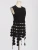 Import 2024 autumn new womens fashion round neck sleeveless round piece splicing design sense fringe senior sense solid color top vest from China