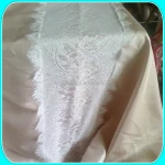 BURLAP TABLE CLOTH WITH IVORY LACE TABLE RUNNER AT THE CENTER