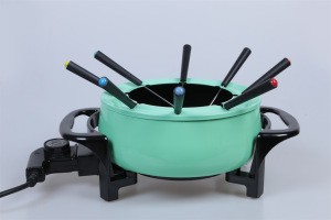 Electric chocolate cheese fondue pot with forks
