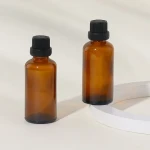 essential oil glass bottles 2024 new arrival empty round brown 50ml Ready to ship skin care oil glass bottle
