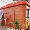 Exquisitely decorated small wooden garden house for all season