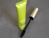 Green color cosmetic plastic round tube with brush head for mascara