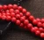 Import High Polishing 6mm Natural Round Smooth Oil Dyed Red Coral Beads For Wholesale from China