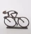 Import Hot product metal art and crafts bicyclist cast iron sculpture for home decoration office table decor from China