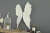 Import INNOVA home decoration living room craft  antique vintage white polyresin resin angel wings wall hanging decor art from China