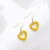 Import Lost Lady New Jewelry Ladies Temperament Style Heart-Shaped Color Hanging Earrings Fashion Light Luxury Dripping Alloy Jewelry from China