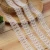Import Manufacturer Embroidery Garment Accessories Trim Lace Wholesale Black White Embroidered Cotton Lace Trim from China