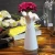 Import Modern wholesale ceramic embossed mini flower vase home decoration vase from China