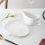 Import New arrival relief design ceramic white sauce jug hotel restaurant unique large gravy boat with saucer stand from China
