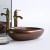 Import New arrived red copper color antique oval ceramic sanitaryware countertop bathroom vessel sink hand wash art basin from China