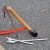 Import Outdoor camping tent pegs cast iron hammer, nail puller, safety hammer with wooden handle from China